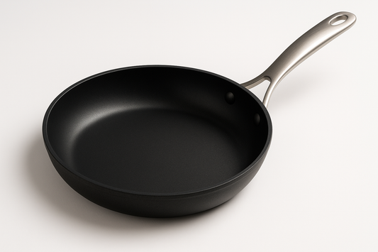 "Baby's non-stick frying pan with steel handle for safe cooking"